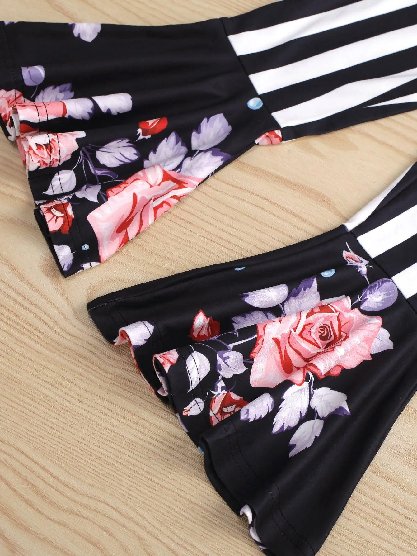 GIRLS FLORAL TOP AND STRIPED BELL BOTTOM PANTS SET