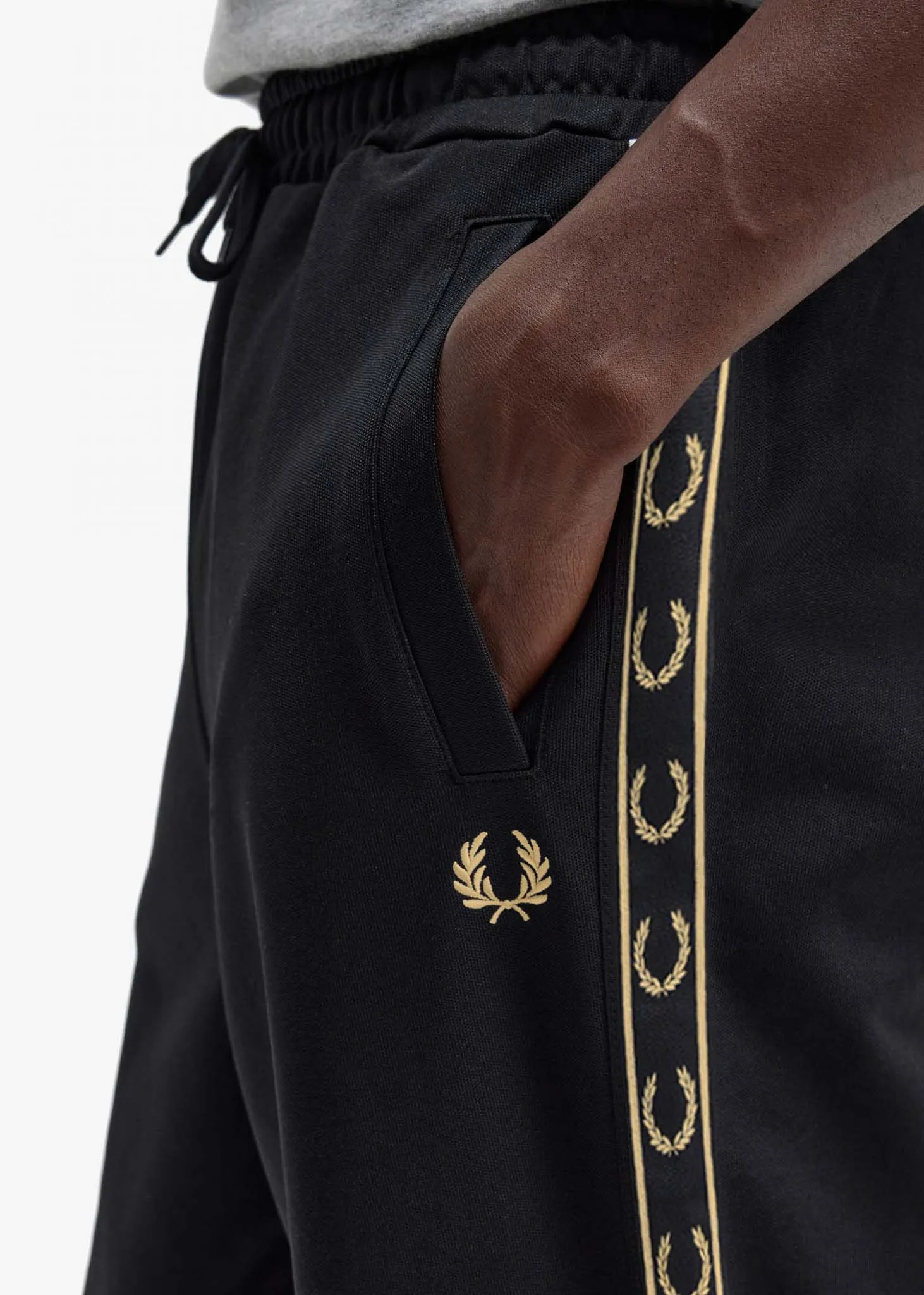 Seasonal taped track pant - black gold